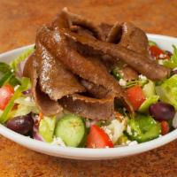 Gyros Salad · Greek salad with gyros meat. Salads come with lettuce, cucumber, onion, tomato, bell pepper,...