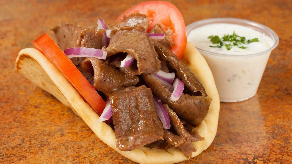 Gyros Sandwich · Served in pita bread with tomatoes, onions, and gyros sauce on the side.