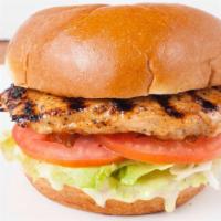 Chicken Sandwich · Served with lettuce, tomato, and mustard sauce.