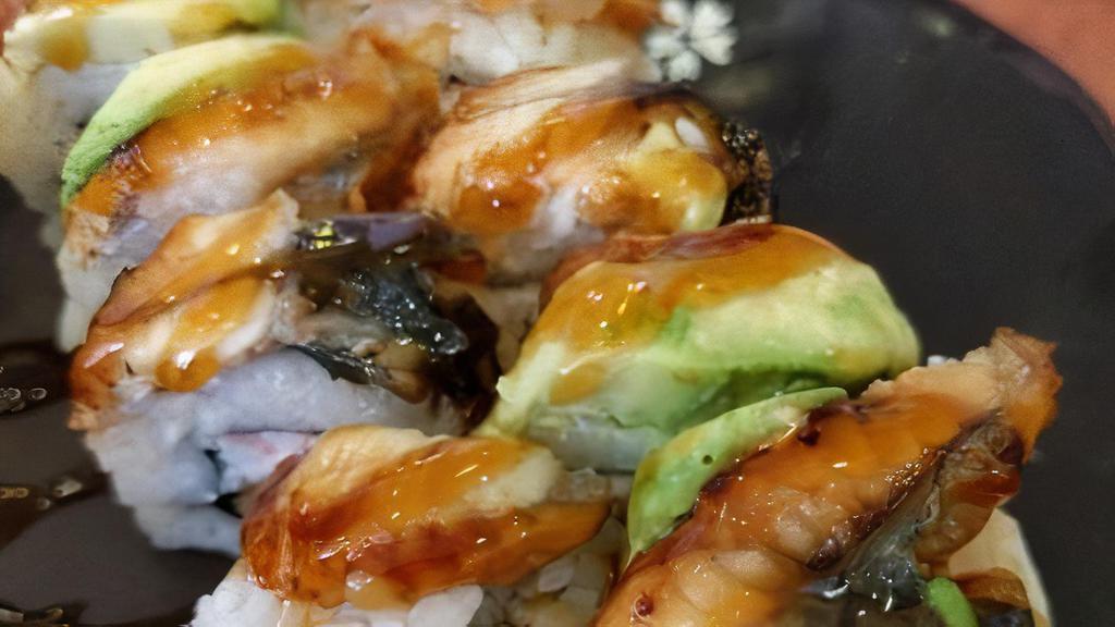 Dragon Roll · Crabmeat, deep-fried shrimp, unagi, avocado with special sauce.