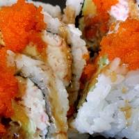 Spider Roll · Contains raw fish.Deep-fried soft shell crab, crab meat, avocado, masago with special sauce....