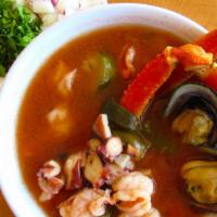 Seven Seas Soup · Shrimp, octopus, fish, scallops, clam, mussels,and snow crabs soup served with onions cilant...