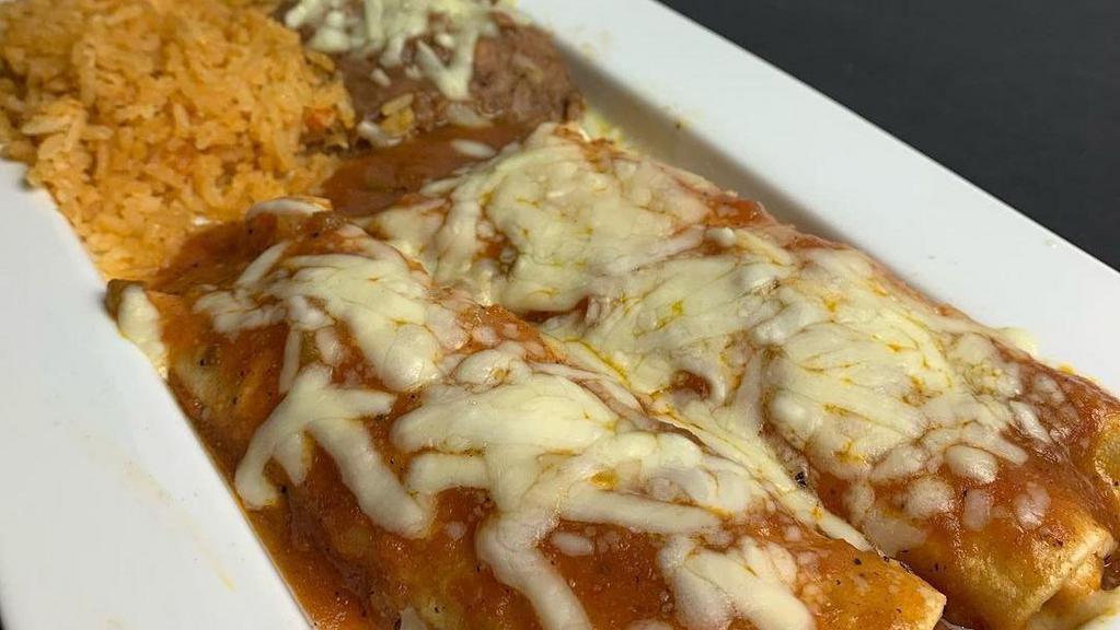 Enchiladas · Corn tortilla filled with your choice of filling, covered with enchilada sauce and topped with cheese. Includes salsa on the side.