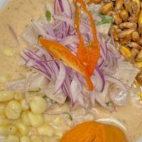 Ceviche De Pescado · Wild Caught Peruvian Mahi-mahi marinated in fresh lime, leche de tigre, & rocoto served with...