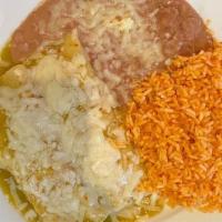 Enchiladas Verdes · Two chicken enchiladas smothered into fresh roasted tomatillo sauce. Served with rice, beans.