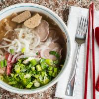 Phở Xe Lửa Đặc Biệt · House Special Beef Rice Noodle Soup. Come with rare steak, brisket, flank, tendon, tripe, an...