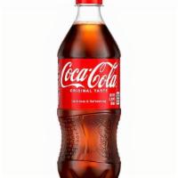 Coca-Cola® · 20 oz bottled Coca-Cola.