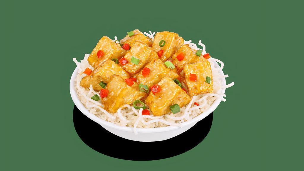 Honey-Seared Crispy Tofu · Crispy Tofu,, tossed in our signature honey-seared garlic sauce. Served over crispy rice sticks and topped with red bell peppers and scallions.