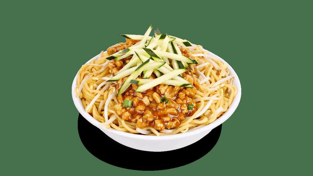 Dan Dan Noodles · House-ground white meat chicken, garlic and scallions, tossed in a chili soy sauce. Served over a bed of steamed noodles and topped with steamed bean sprouts and julienne cucumbers.. [Somewhat Spicy]