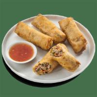 Chicken Egg Roll · Hand-rolled, crispy egg rolls filled with seasoned chicken, cabbage, black mushrooms, carrot...