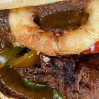 The Punjabi Cowboy · House-Made Punjabi BBQ Sauce, Onion Rings, Pickled Jalapeños and Bell Peppers