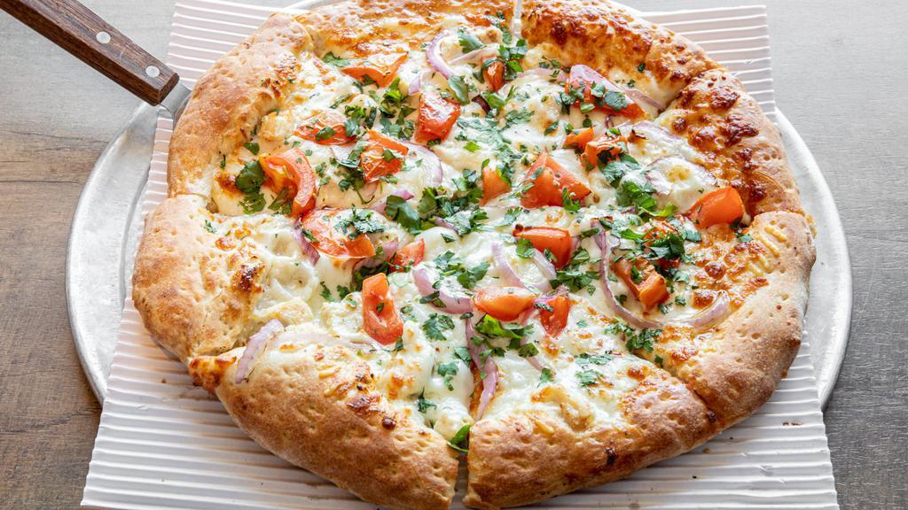 Pesto Supreme · Vegetarian pizzas. Mozzarella cheese, pesto sauce, artichoke heart, fresh garlic, tomato, and mushroom.