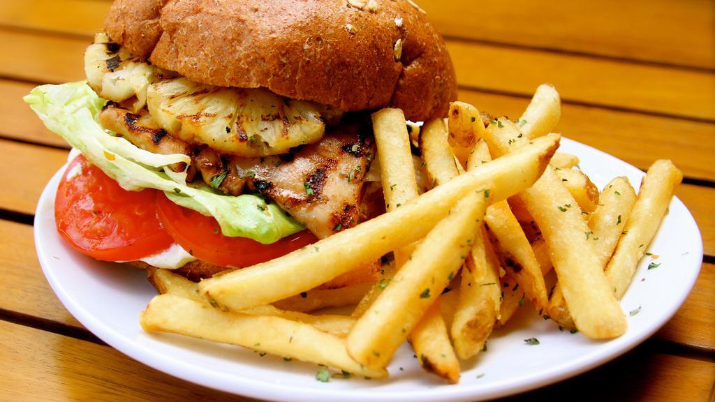 Chicken Sandwich Combo · With fries and drink. All natural chicken breast, crisp lettuce, tomatoes, mayo, homemade island bbq glaze and toasted bun.