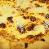 Pizza Quattro Fromaggi · White pizza, mozzarella, provolone, Gorgonzola & Parmigiano Reggiano.