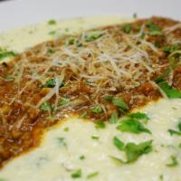 Ragu Polenta · Topped with bolognese ragu or mushroom ragu.