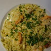 Pasta Shrimp Scampi Cream · Shrimp sauteed in olive oil, red pepper flakes, and a creamy lemon garlic sauce.