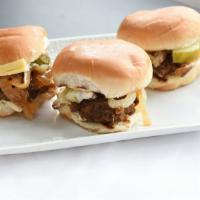 Meatball Sliders · Three mini vegan beef patties served with grilled onions, pickles, and Vegan cheese, on mini...