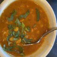 Daal Makhni · Black lentils slow cooked overnight with traditional spices.