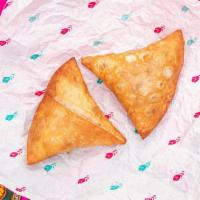 Cheesy Jalapeno Chicken Tikka Samosa, Single Samosa · Fried triangular pastry filled with chicken tikka, white cheddar cheese, jalapeño and desi s...