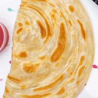 Lachha Paratha · Our signature flaky, buttery flatbread. Always made in-house using authentic ghee with layer...