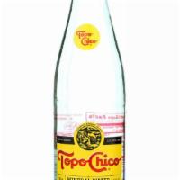 Topo Chico · Sparkling mineral water. 12 oz glass bottle with non twist-off cap.