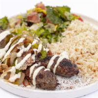 Kafta Kabab · Select ground beef mixed with ground lamb, parsley and Mediterranean spices. Topped with bel...