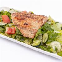 Salmon Fattoush · Marinated in house seasoning served top of fattoush salad.