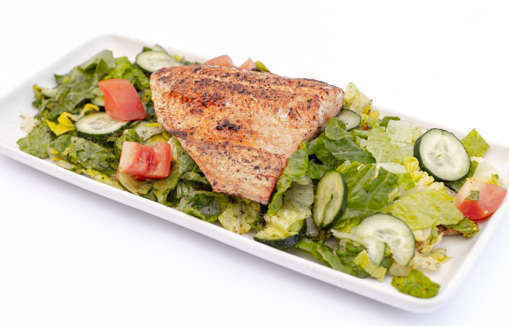 Salmon Fattoush · Marinated in house seasoning served top of fattoush salad.