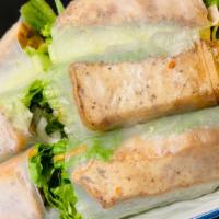 Thai Spring Rolls · Cabbage, carrots and glass noodles
wrapped in paper skin. Served with
sweet and sour sauce. ...