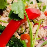 Larb Gai · Ground chicken tossed with mint, dried chili, red and green onion, and lime juice.