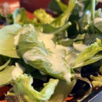 Garden Salad · Avocado, English cucumber, spring mix lettuce/home made dressing.