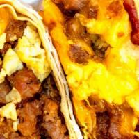 Sausage, Egg, And Cheese · Sausage, egg, and cheese breakfast sandwich or burrito with cheddar cheese   your choice of ...