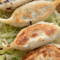 Potstickers · pan-fried, pork & chives (7)
