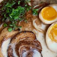 Steamy Piggy Ramen · 12-hour tonkotsu broth, noodle, ajitama egg, black garlic oil, chashu pork