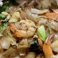 Shrimp Garlic Noodles · Pan-fried flat-wide noodles, egg, shrimp, mixed veggies.