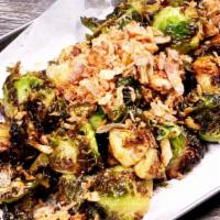 Brussel Sprout · Lightly fried Brussel Sprouts with Sweet Soy Sauce and Crunch onion