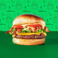 Veg-E-Licious Cheeseburger · Meatless burger patty, meatless bacon, American cheese*, lettuce, tomato, and Veg-e-licious ...