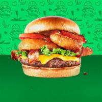 Super-Veg-E-Licious Burger · Meatless burger patty, bacon, cheddar cheese, onion rings, lettuce, tomato, and BBQ sauce on...