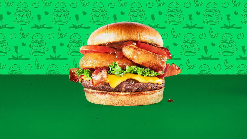 Super-Veg-E-Licious Burger · Meatless burger patty, meatless bacon, cheddar cheese*, onion rings, lettuce, tomato, and BBQ sauce on a toasted bun (*contains dairy)
