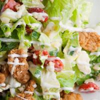 Crispy Chicken Salad · Crispy Chicken tenders with Lettuce, Onions, Cherry Tomatoes and Cheese. Served with your ch...