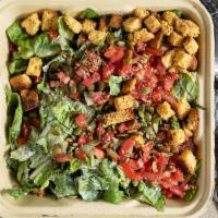 Caesar Salad · Gluten free. Romaine lettuce, tomatoes, pecan crumble, pumpkin seeds, capers, garlic gluten ...