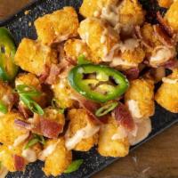 Fully Loaded Tots (Half-Order) · queso, fresh jalapeños, applewood smoked bacon & scallions