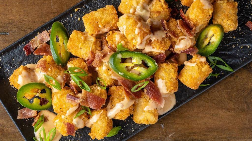 Fully Loaded Tots (Full-Order) · queso, fresh jalapeños, applewood smoked bacon & scallions