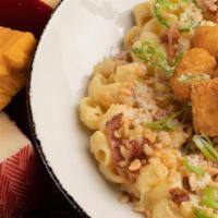 The Popper Tot · mac’s cheese sauce, creamy cheddar & parmesan cheese, spicy jalapeños, crispy bacon, capped ...