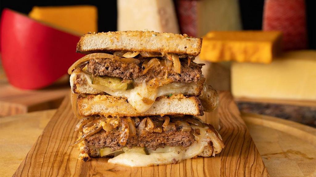 Patty'S Melt Down · custom blend burger patty, secret sauce, caramelized onions & pickles