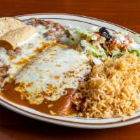 Two Cheese Enchiladas · Your choice of cheese, chicken (with sour cream), ground beef, or shredded beef.