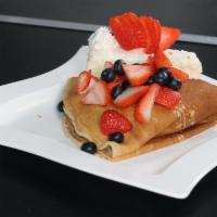 Cream Cheese & Berries Crepe · Philadelphia cream cheese sandwiched with strawberries and blueberries, topped with more ber...
