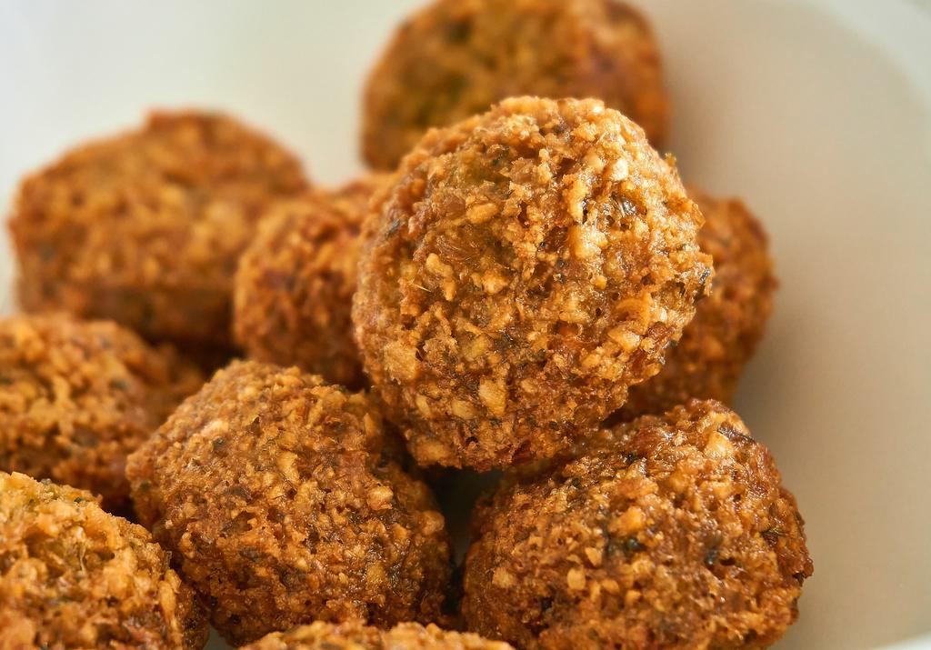 4 Pieces Falafel · A delicious deep-fried blend of ground chickpeas and seasonings.
