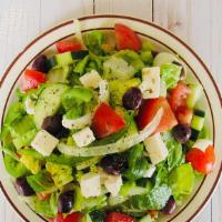 Mediterranean Salad · Mixed greens, tomatoes, cucumbers and onions topped with feta cheese and Kalamata olives tos...