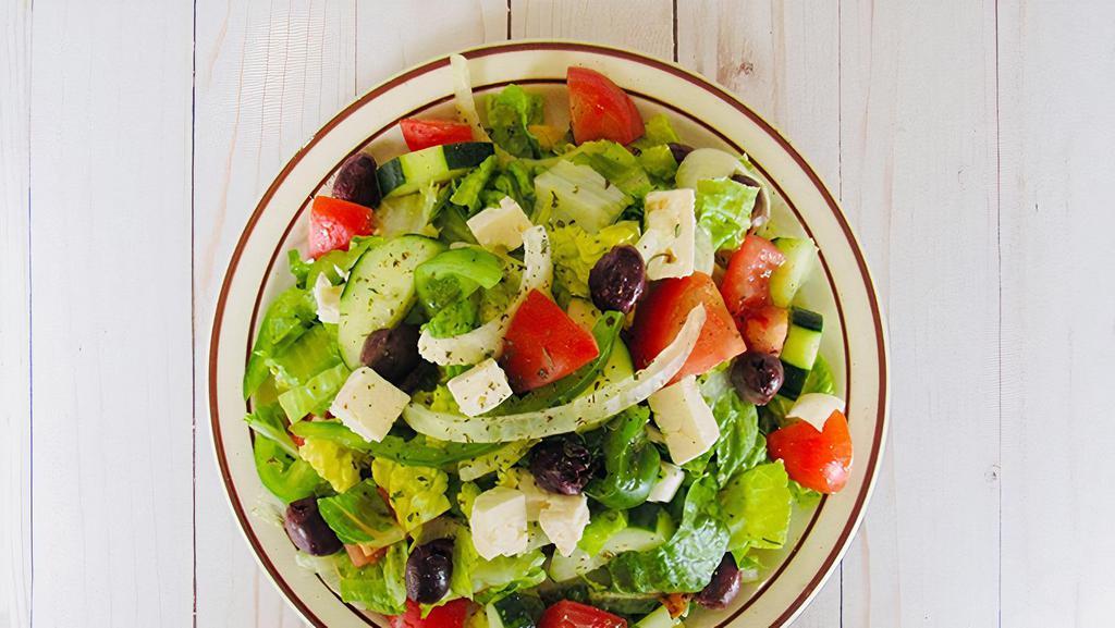 Mediterranean Salad · Mixed greens, tomatoes, cucumbers and onions topped with feta cheese and Kalamata olives tossed in our signature house dressing.